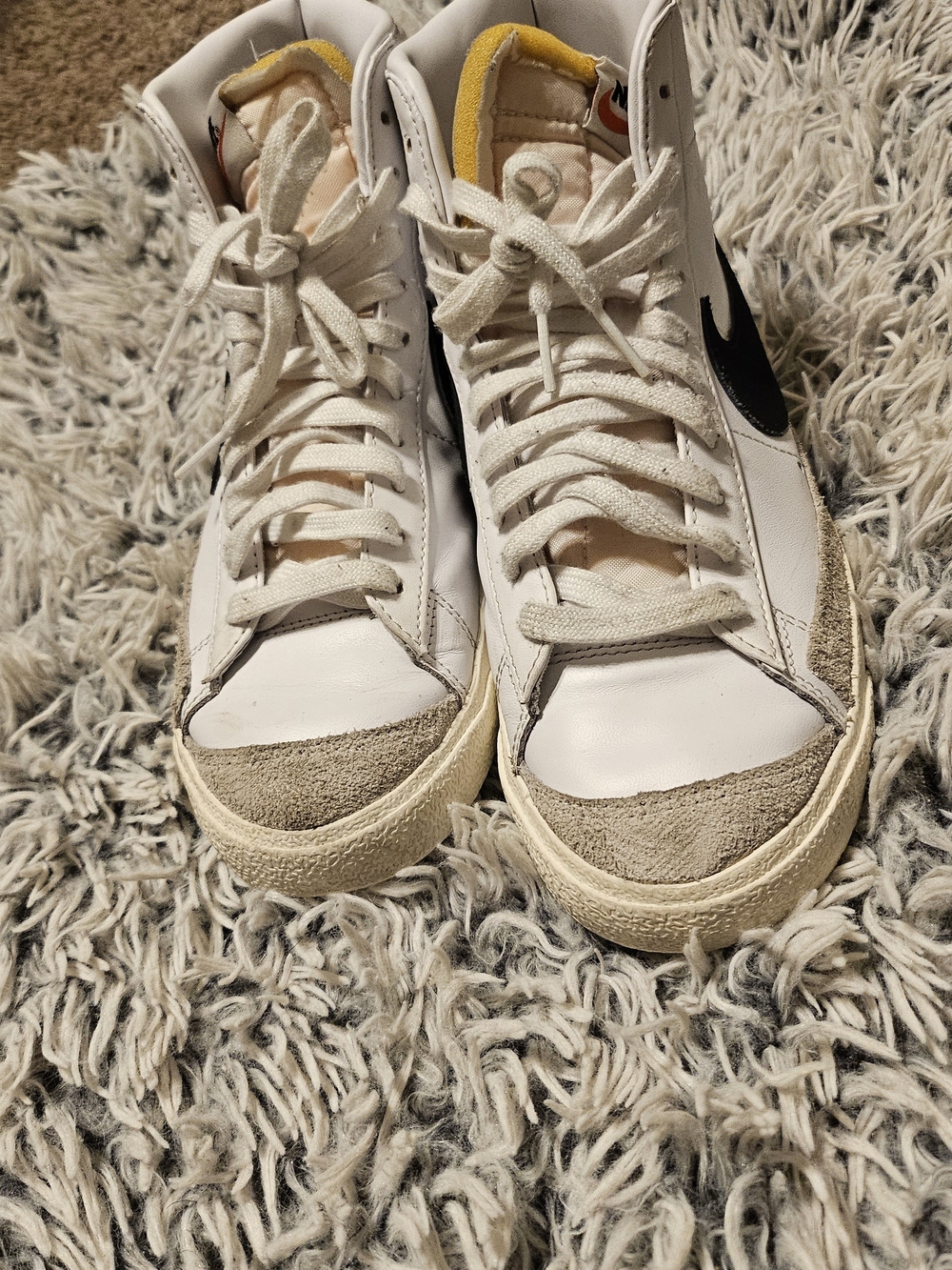 Nike Women's White High-Top Sneakers with Black Swoosh and Beige Accents